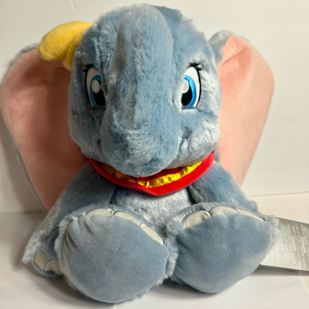 NWT. Disney dumbo big foot plush 11”H. r Dumbo in this super soft plush toy
